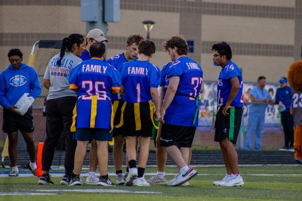 The royals huddling up before their next play. 