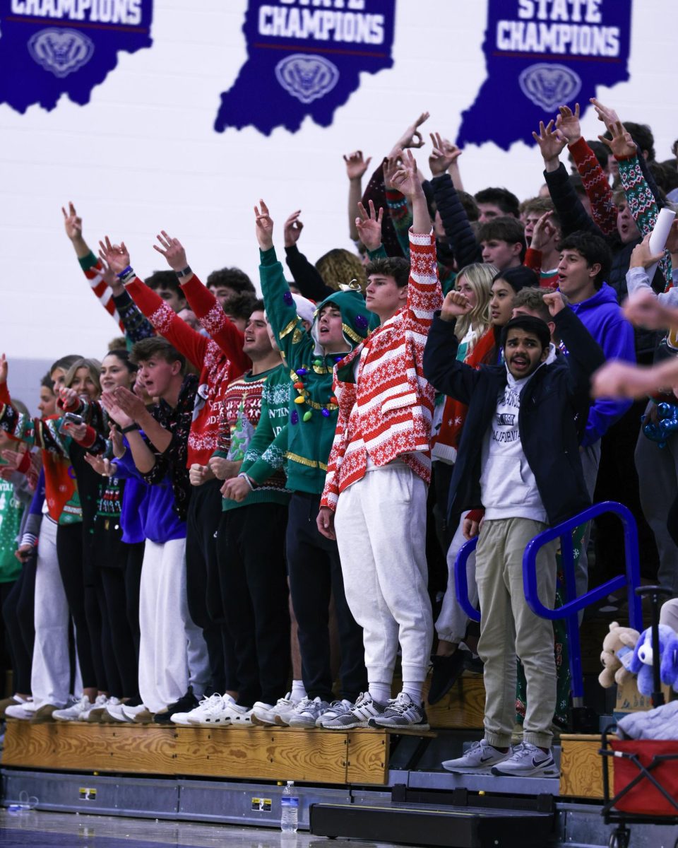The Student section watches a play against the Brebeuf Jesuit Braves on December 13th, 2024.