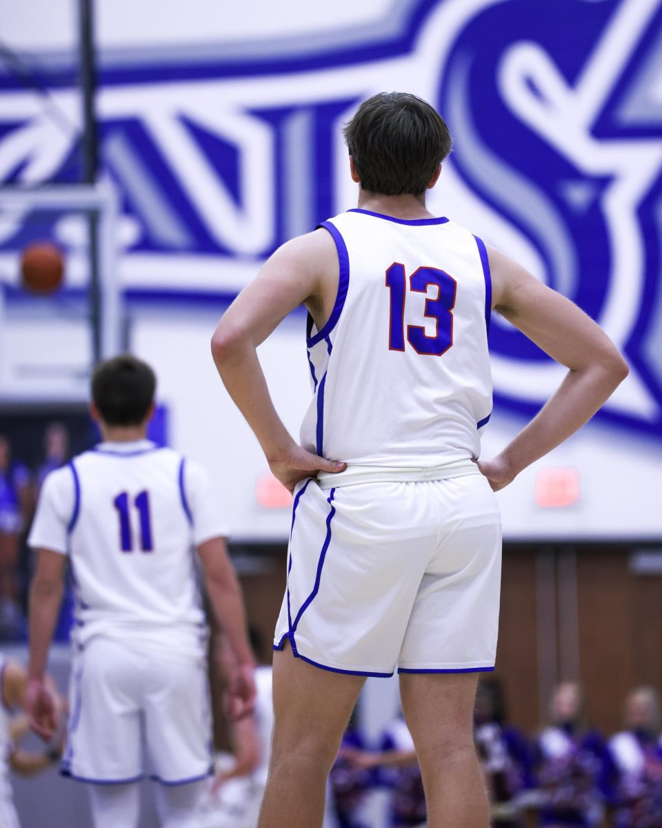 Braeden Totton watches a play against the Brebeuf Jesuit Braves on December 13th, 2024.