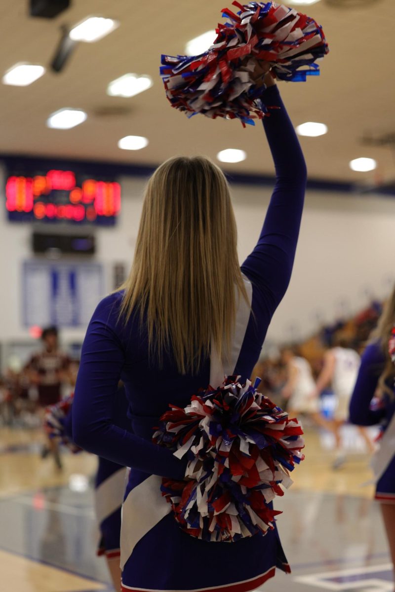 Girls Cheerleading Supporting Boys Basketball against Brebeuf on Dec. 13.