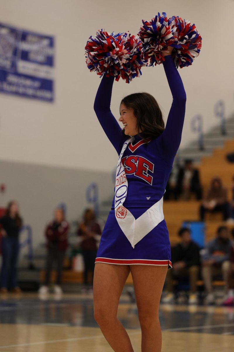 Girls Cheerleading Supporting Boys Basketball against Brebeuf on Dec. 13.