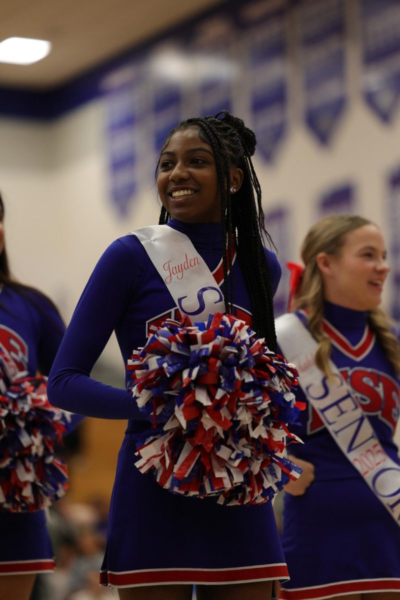 Girls Cheerleading Supporting Boys Basketball against Brebeuf on Dec. 13.