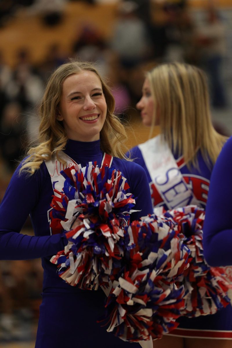 Girls Cheerleading Supporting Boys Basketball against Brebeuf on Dec. 13.