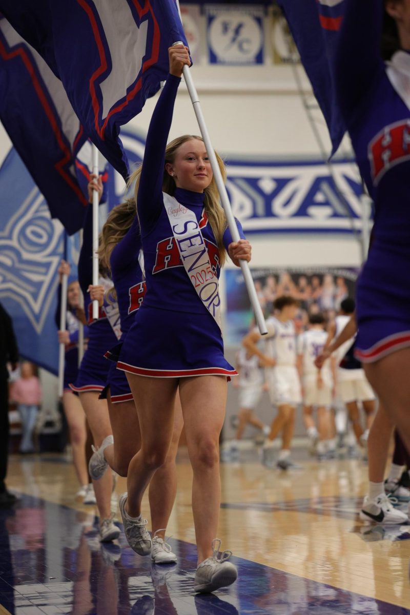 Girls Cheerleading Supporting Boys Basketball against Brebeuf on Dec. 13.