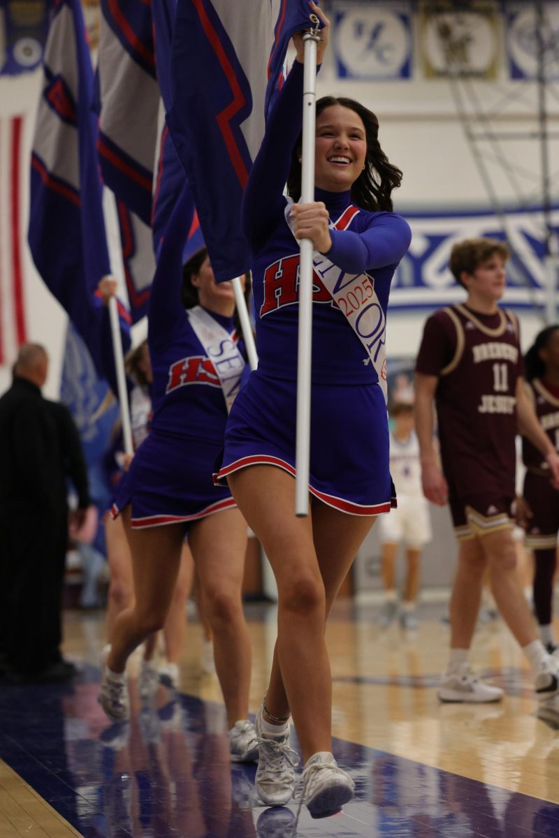 Girls Cheerleading Supporting Boys Basketball against Brebeuf on Dec. 13.