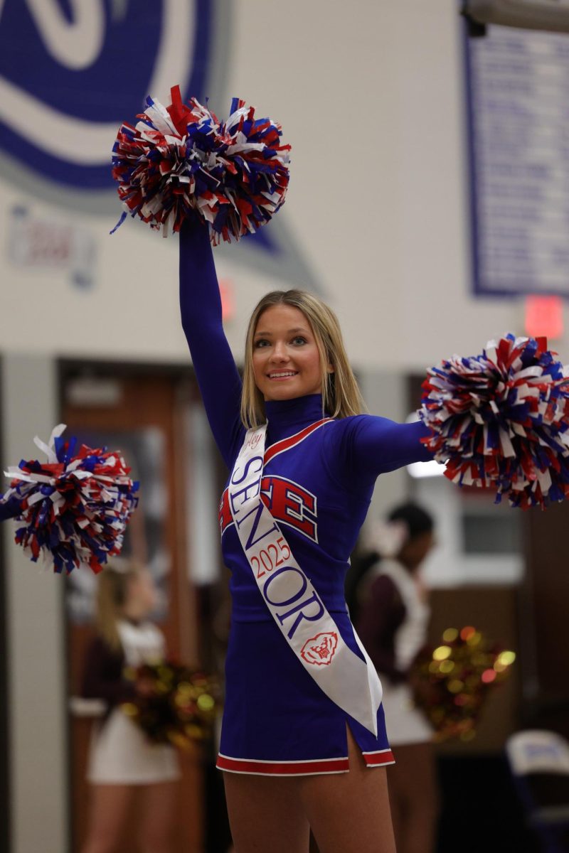 Girls Cheerleading Supporting Boys Basketball against Brebeuf on Dec. 13.