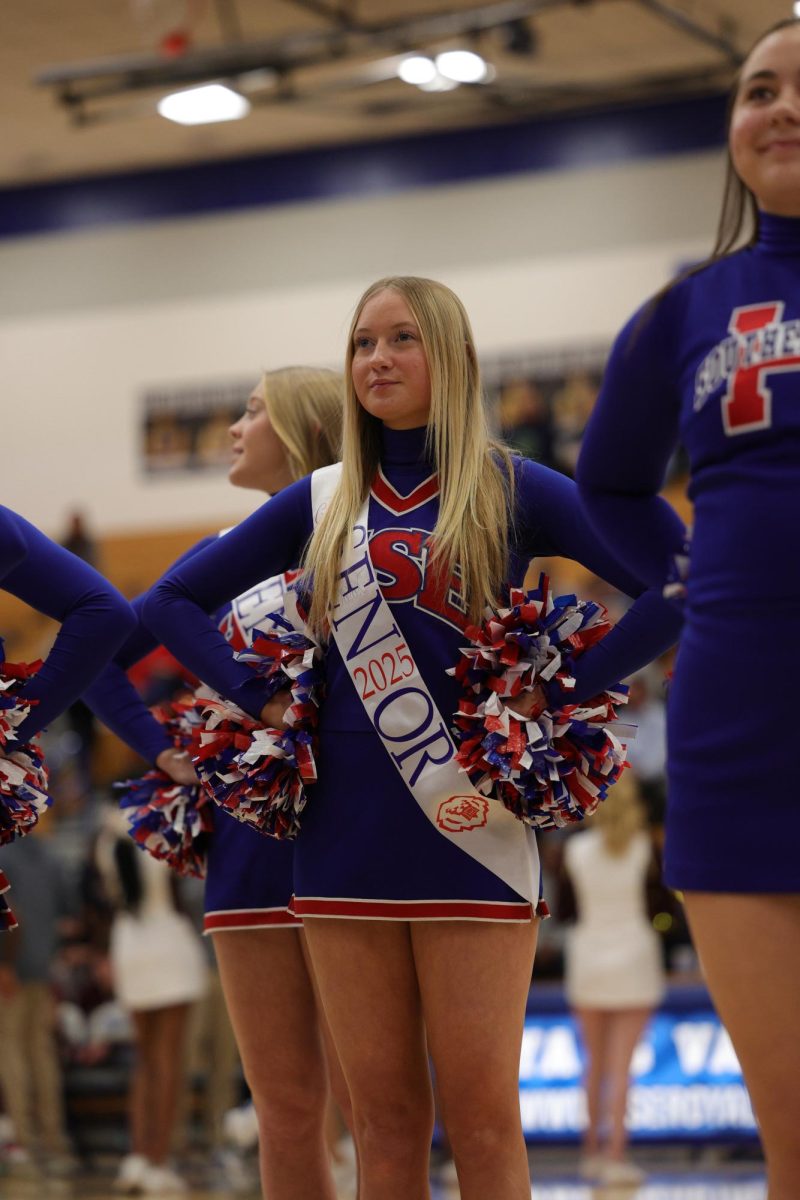 Girls Cheerleading Supporting Boys Basketball against Brebeuf on Dec. 13.