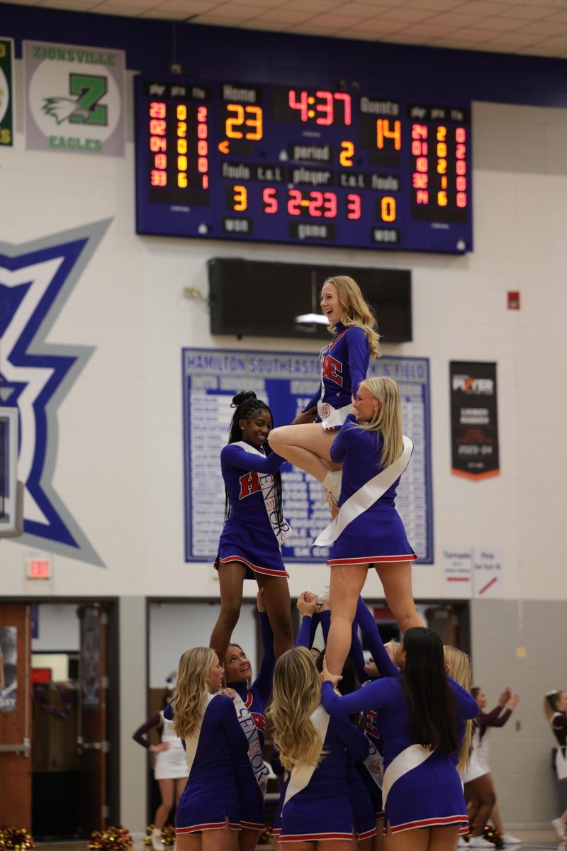 Girls Cheerleading Supporting Boys Basketball against Brebeuf on Dec. 13.