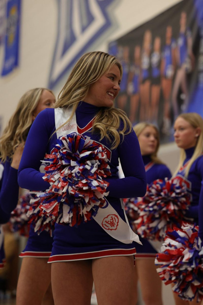 Girls Cheerleading Supporting Boys Basketball against Brebeuf on Dec. 13.