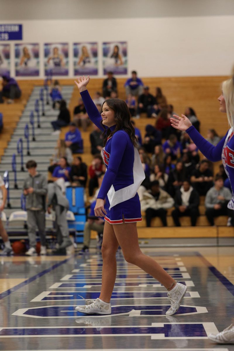 Girls Cheerleading Supporting Boys Basketball against Brebeuf on Dec. 13.