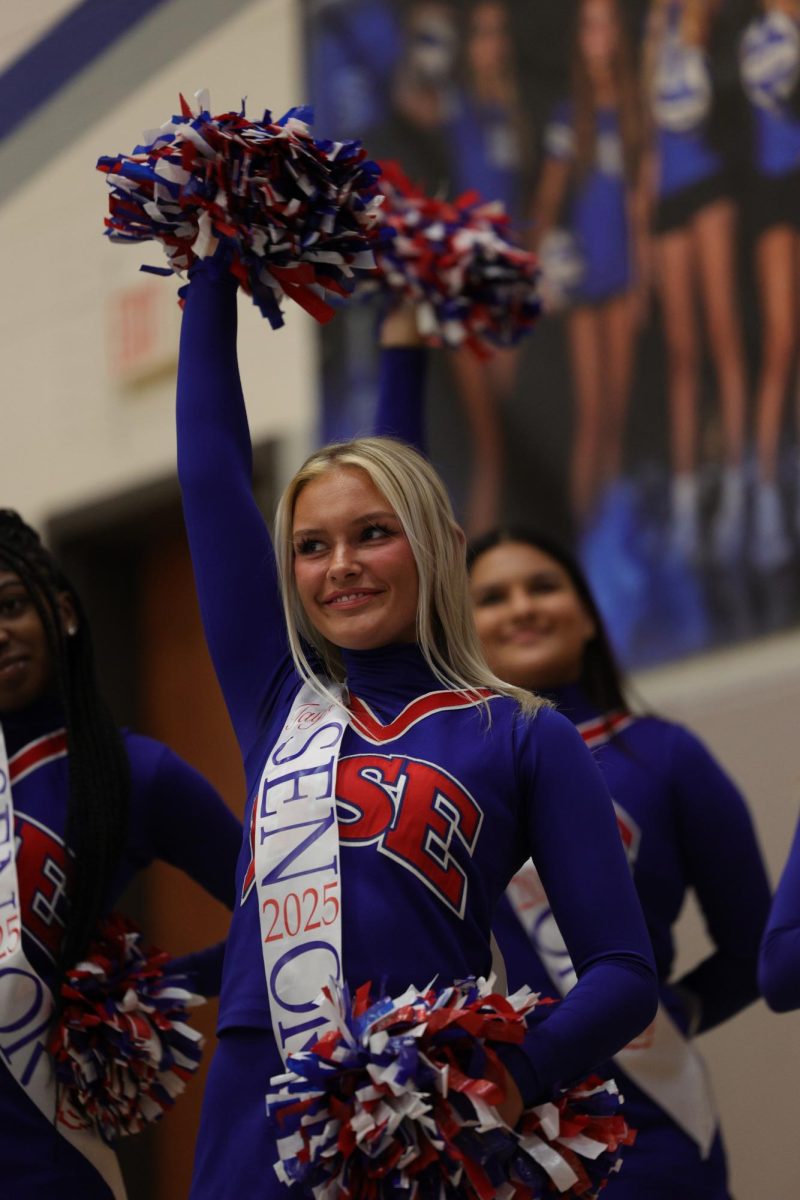 Girls Cheerleading Supporting Boys Basketball against Brebeuf on Dec. 13.