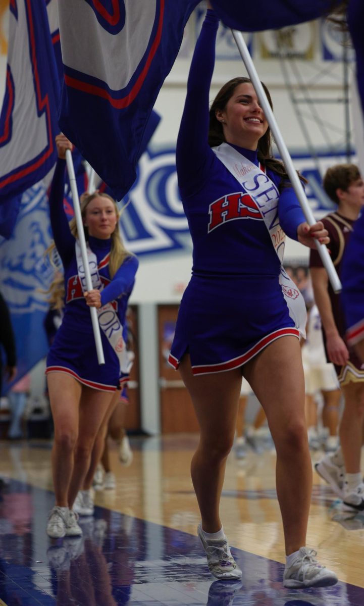 Girls Cheerleading Supporting Boys Basketball against Brebeuf on Dec. 13.