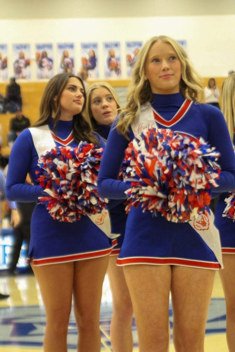 Girls Cheerleading Supporting Boys Basketball against Brebeuf on Dec. 13.