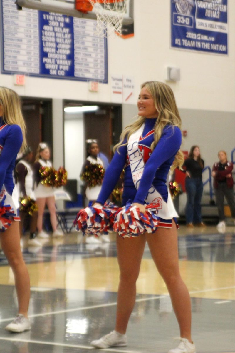 Girls Cheerleading Supporting Boys Basketball against Brebeuf on Dec. 13.