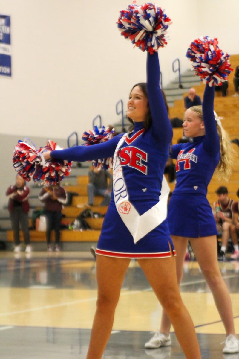 Girls Cheerleading Supporting Boys Basketball against Brebeuf on Dec. 13.