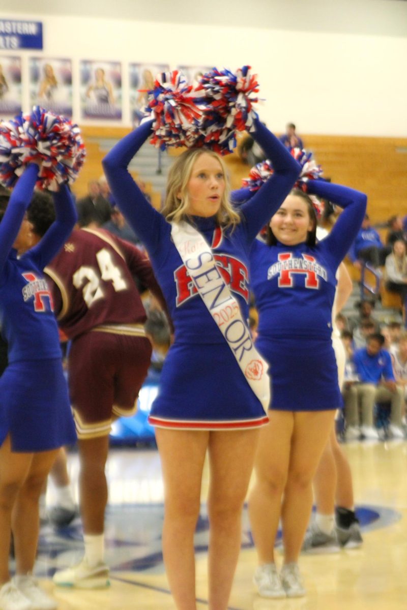 Girls Cheerleading Supporting Boys Basketball against Brebeuf on Dec. 13.