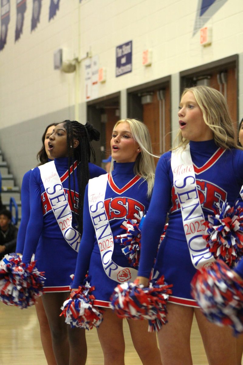 Girls Cheerleading Supporting Boys Basketball against Brebeuf on Dec. 13.