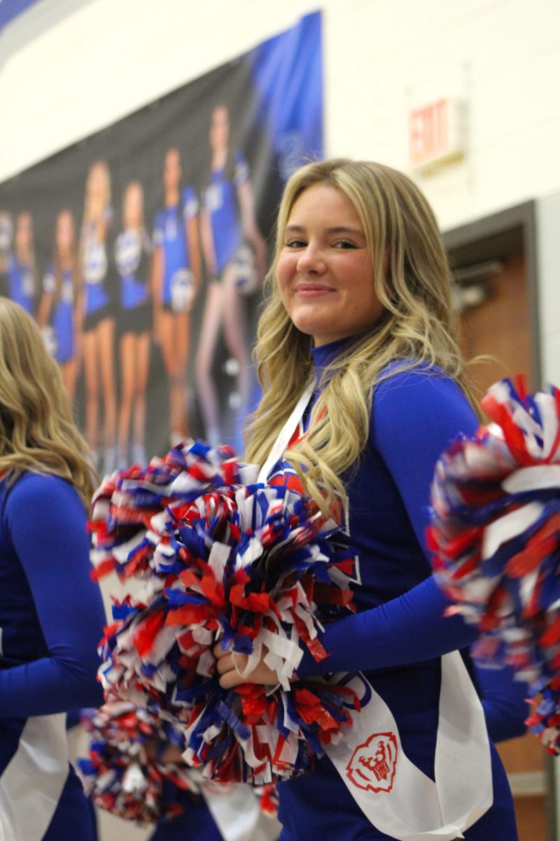 Girls Cheerleading Supporting Boys Basketball against Brebeuf on Dec. 13.