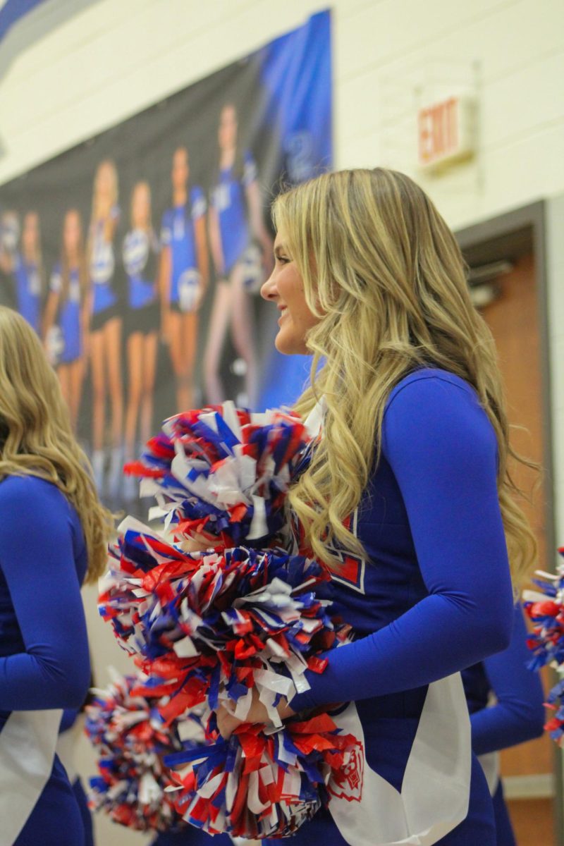 Girls Cheerleading Supporting Boys Basketball against Brebeuf on Dec. 13.