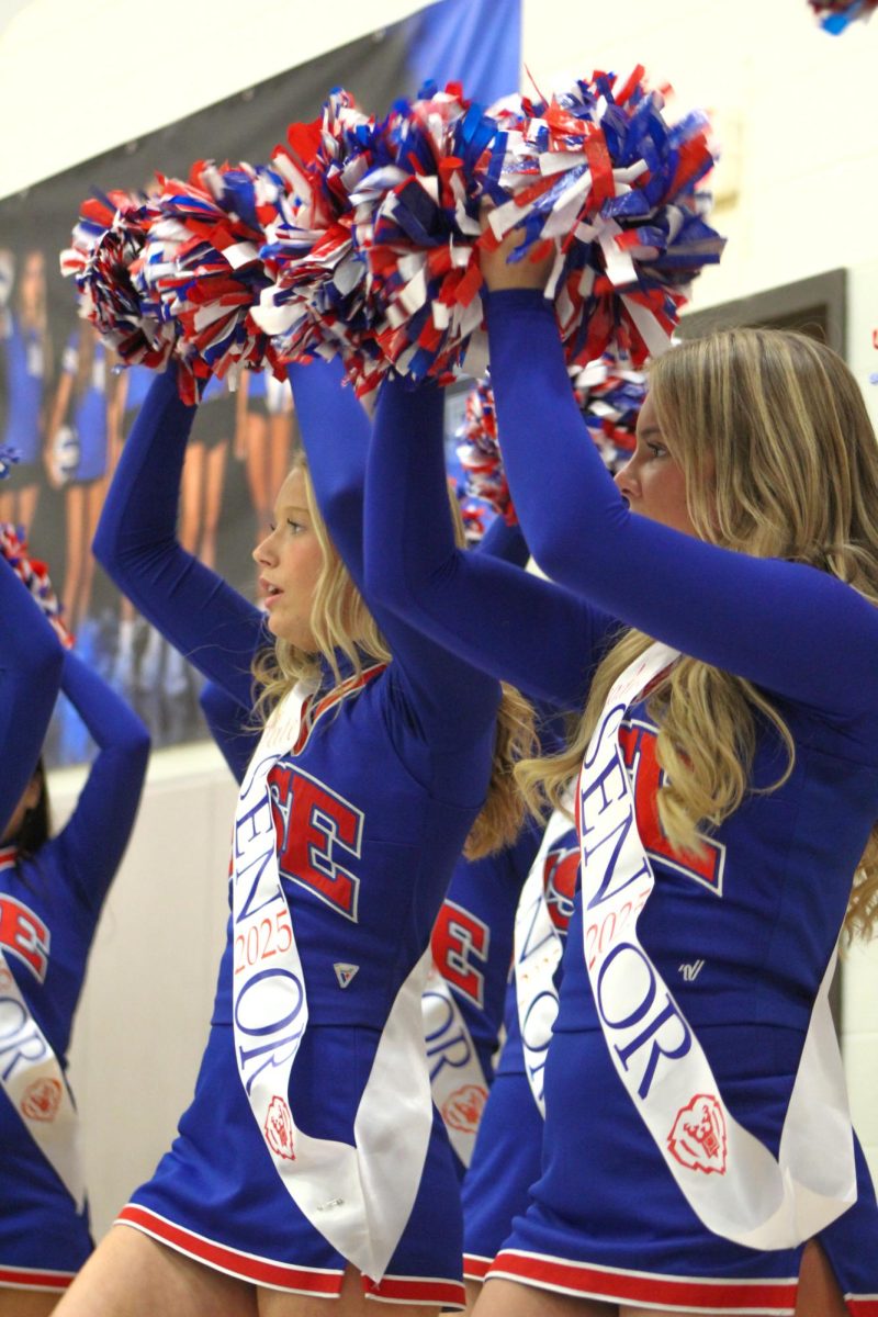 Girls Cheerleading Supporting Boys Basketball against Brebeuf on Dec. 13.