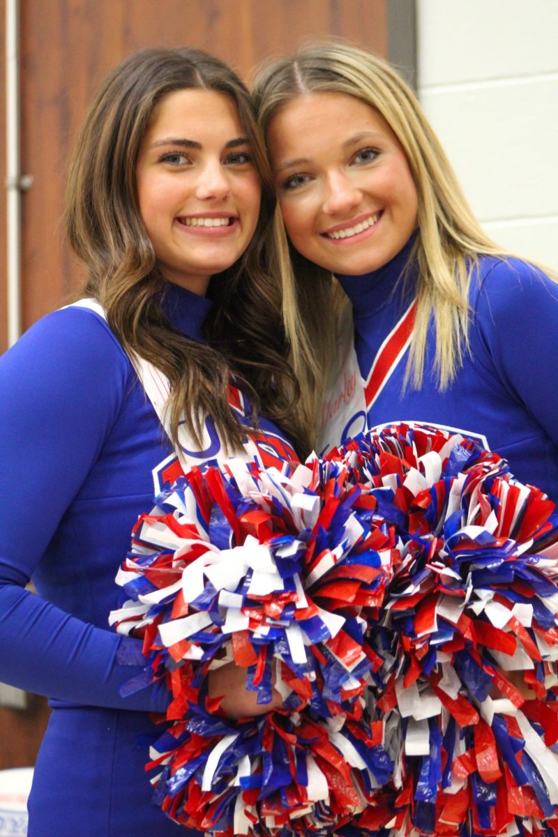 Girls Cheerleading Supporting Boys Basketball against Brebeuf on Dec. 13.