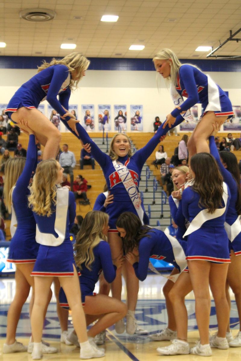 Girls Cheerleading Supporting Boys Basketball against Brebeuf on Dec. 13.