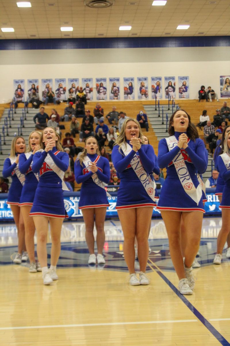 Girls Cheerleading Supporting Boys Basketball against Brebeuf on Dec. 13.