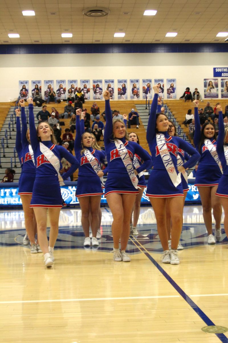 Girls Cheerleading Supporting Boys Basketball against Brebeuf on Dec. 13.