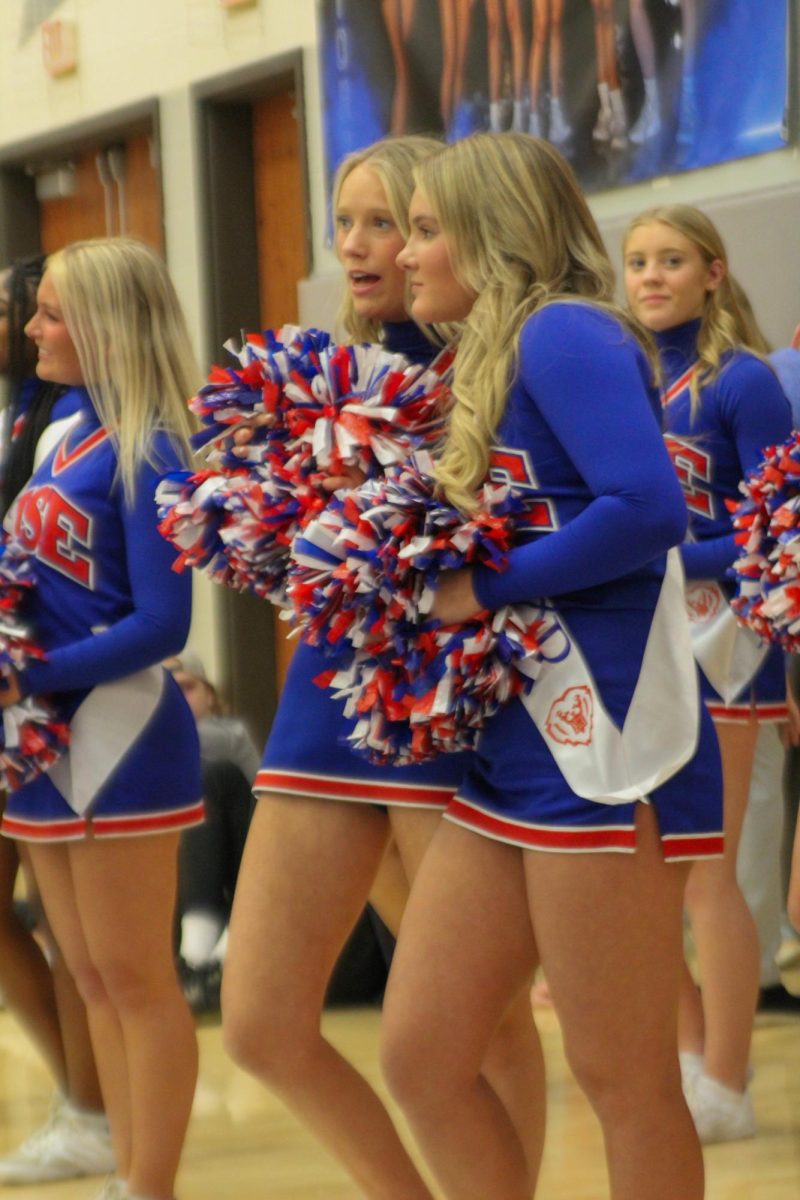 Girls Cheerleading Supporting Boys Basketball against Brebeuf on Dec. 13.