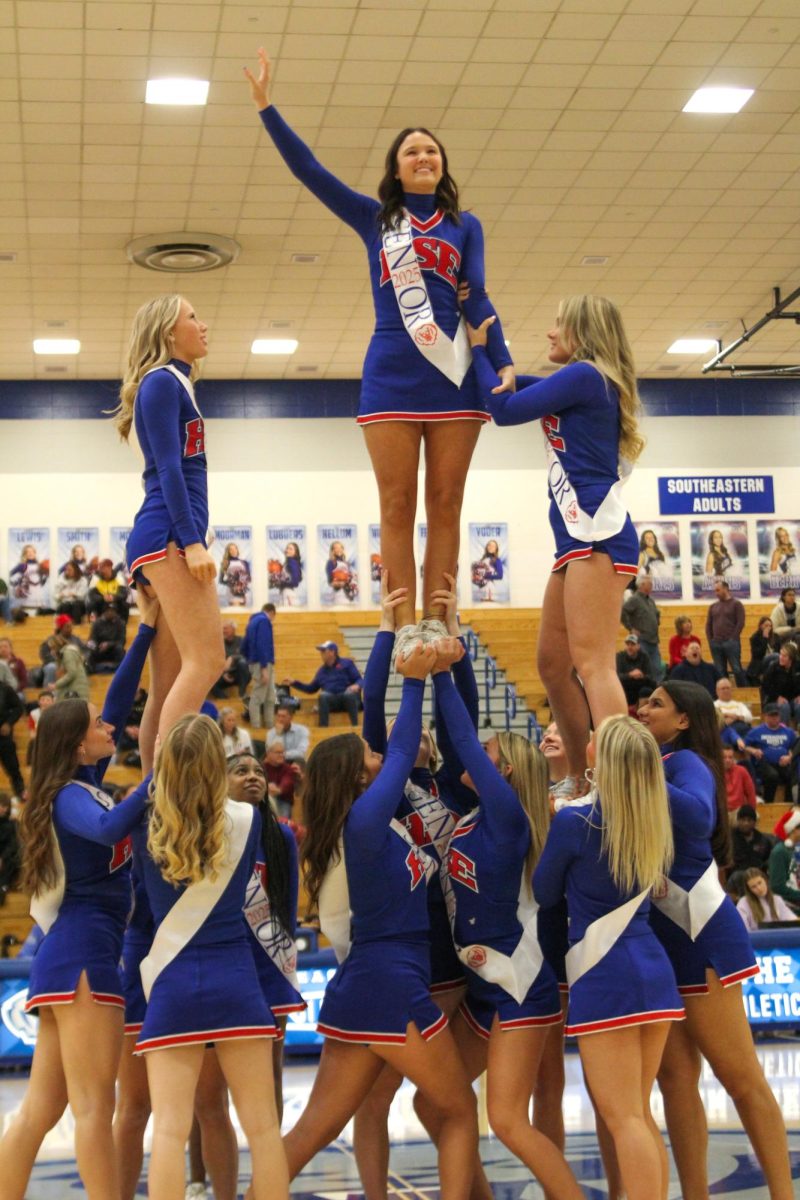 Girls Cheerleading Supporting Boys Basketball against Brebeuf on Dec. 13.