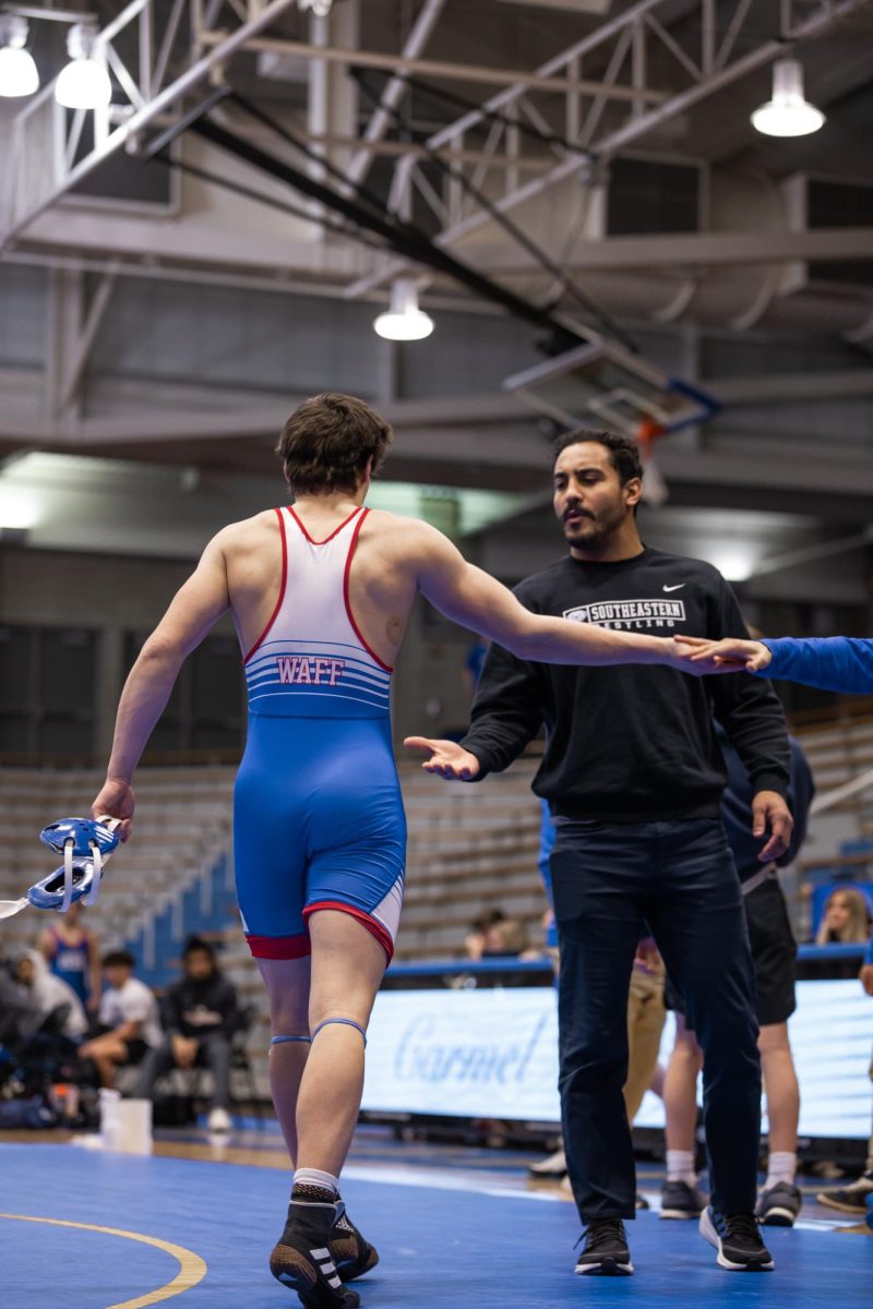 Boys Wrestling defeats Carmel on January 22, 2025 at Carmel High School.