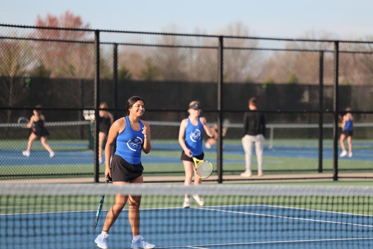 Ella Tappendorf and Naina Patwardhan share many laughs while on the court during their match against 
