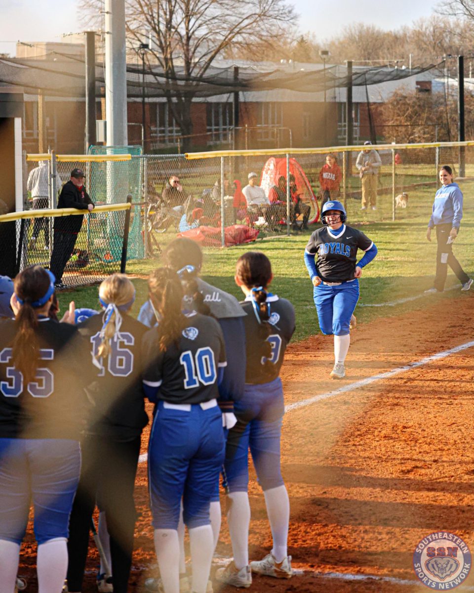 Kenzie lee running home after hitting it out of the park.