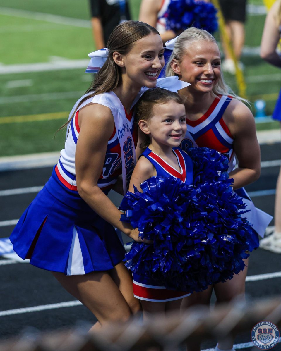 Bright smiles from the cheerleaders on Senior Night at Hamilton Southeastern High School on August 22.