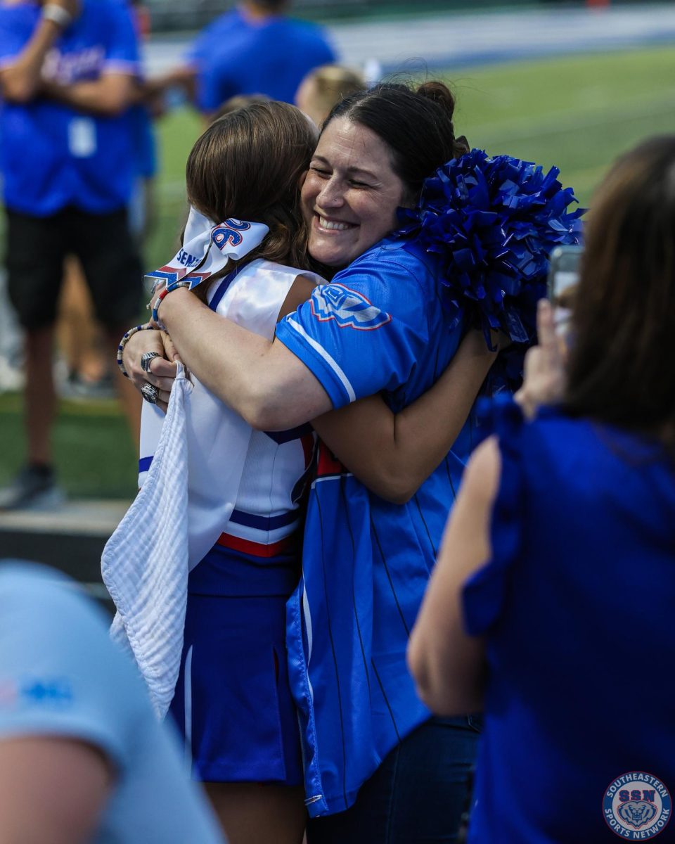 Bright smiles from the cheerleaders on Senior Night at Hamilton Southeastern High School on August 22.