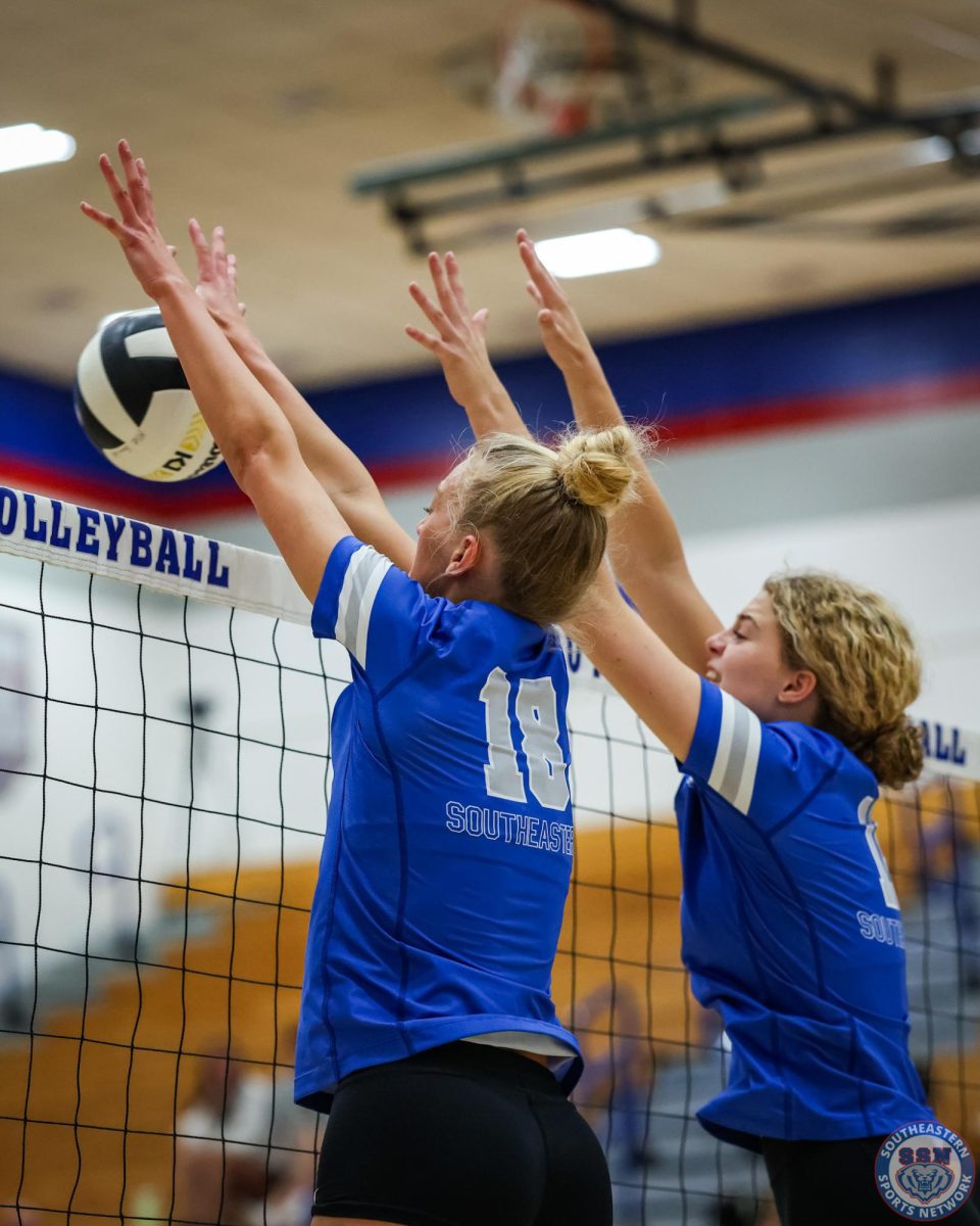 Merritt Sliwa, left, blocking while playing Benton Central Jr-Sr High School, at home, on August 23rd.