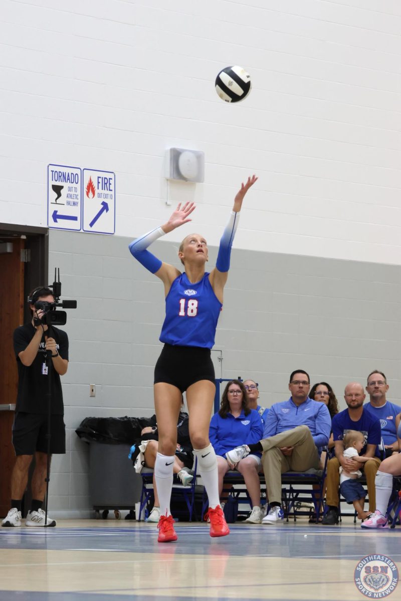 Merritt Sliwa serving at HSE against Fishers on 9.11.25