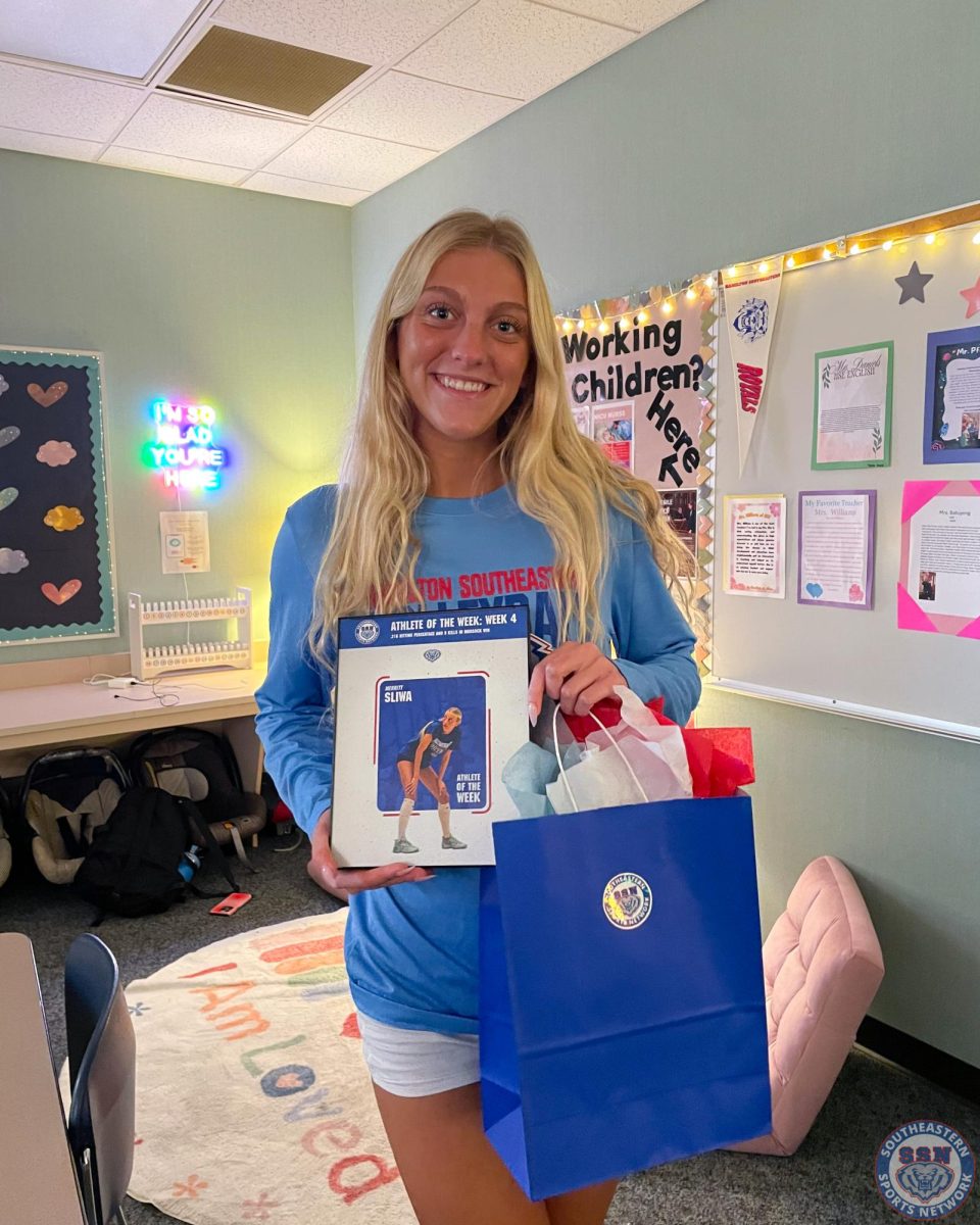 Merritt Sliwa accepting her award for Athlete of the Week, Week #5, at Hamilton Southeastern High School on September 17th.