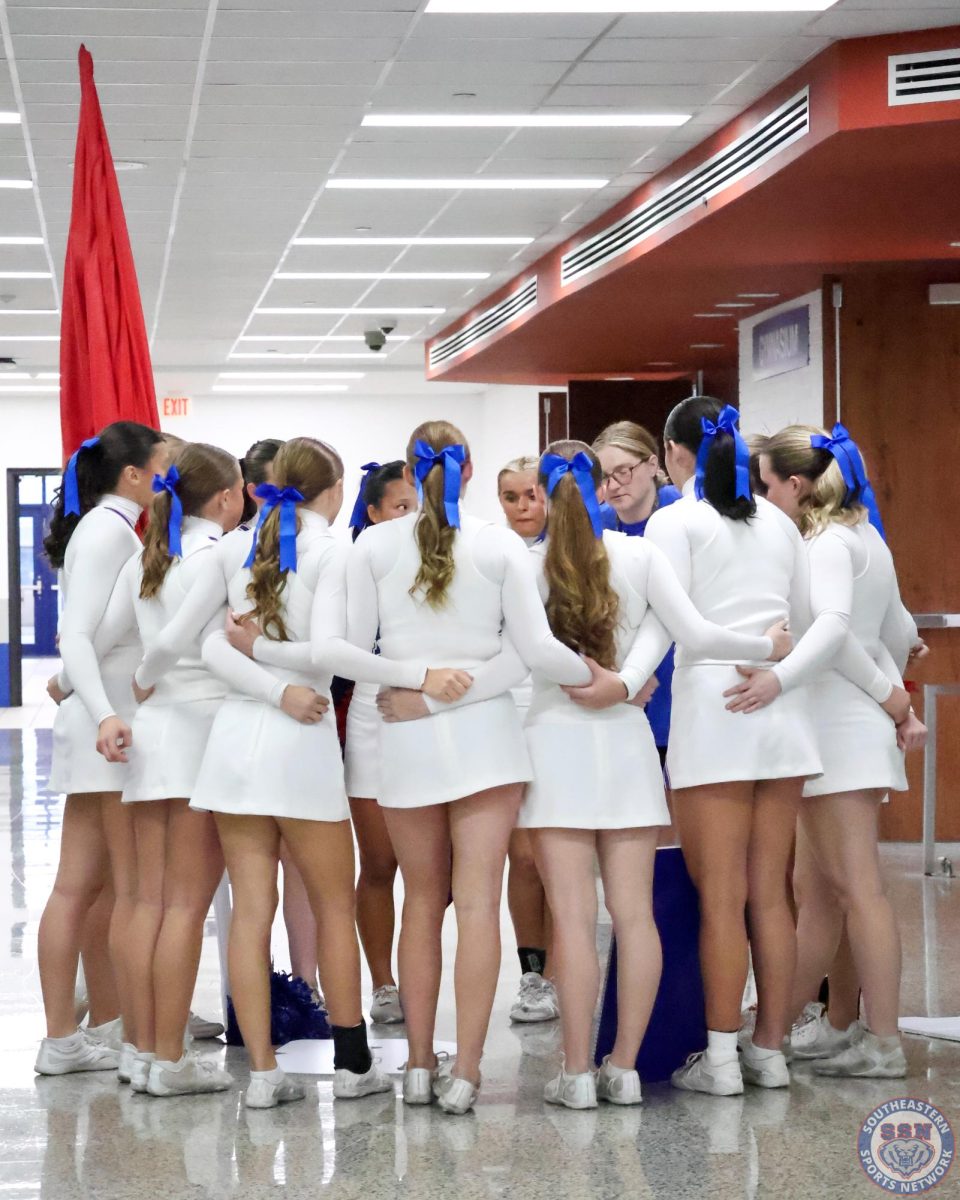 Behind the Mat: The Making of a Cheer Team.