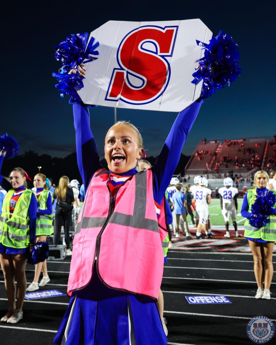 Lexi Perozzi cheers Friday night football against North Central at HSE on August 28, 2025