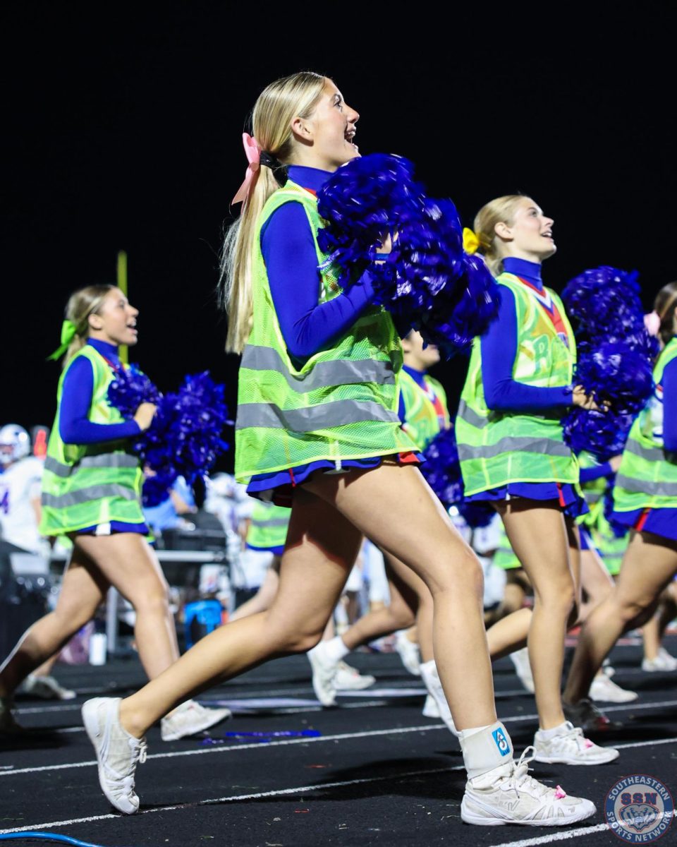 The cheerleading team performed under the stadium lights at North Central High School on August 29.