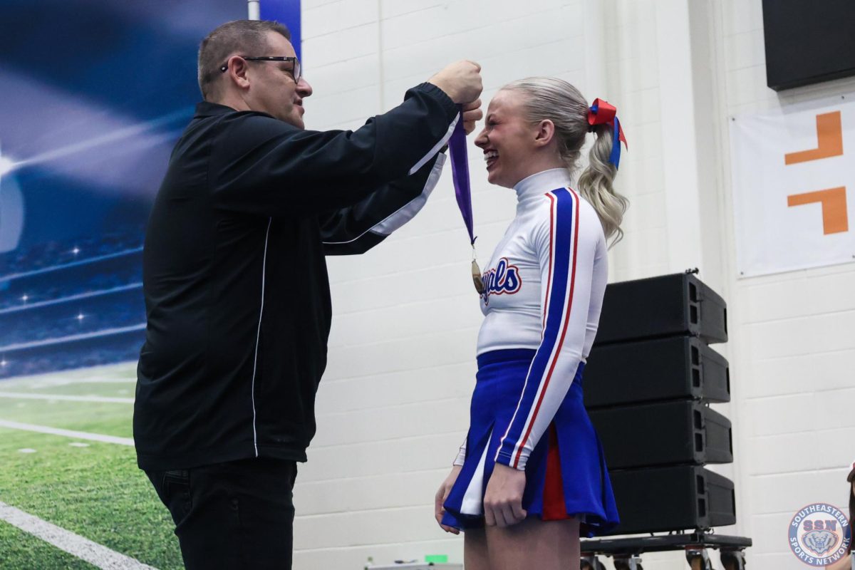 Perozzi makes Cheerleading history with HCCA All-State honor