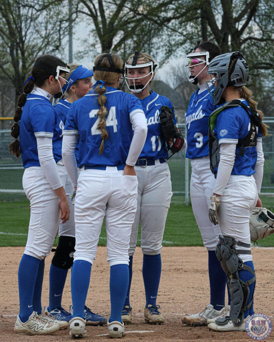 The infielders gathered for a group huddle at Hamilton Southeastern High School against Zionsville on April 15, 2025.
