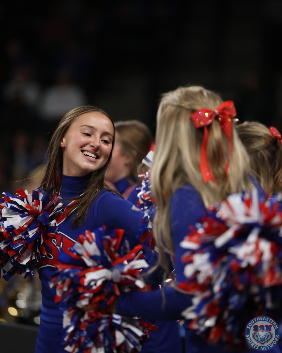 Basketball Cheerleaders show spirit at the Boys Basketball Game at Mudsock on December 19, 2025.