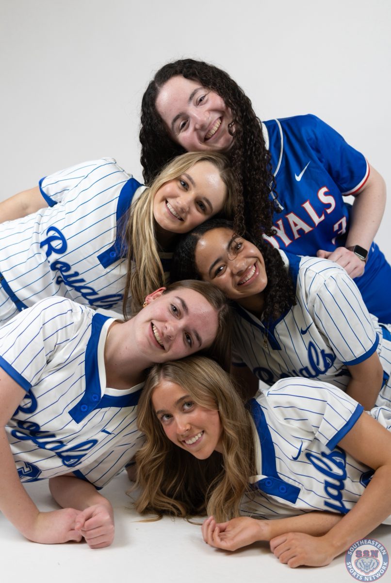 Varsity Softball takes a fun group photo at their media day.